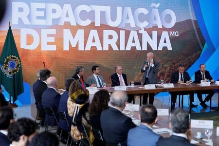FILE PHOTO: Signing ceremony for 2015 dam collapse compensation agreement