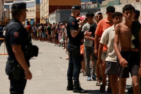 FILE PHOTO: Mass crossings of migrants on foot and by