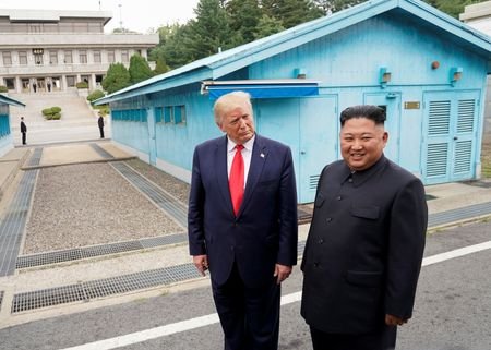 FILE PHOTO: Trump meets with North Korean leader Kim Jong