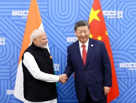 FILE PHOTO: Chinese President Xi and India Prime Minister Modi