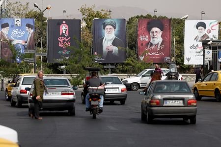 Banners with pictures of the late Supreme Leader of Iran,