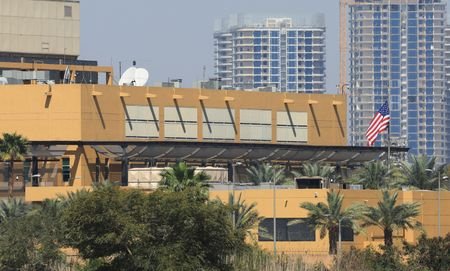 The U.S. flag flies at the U.S. embassy, in Baghdad