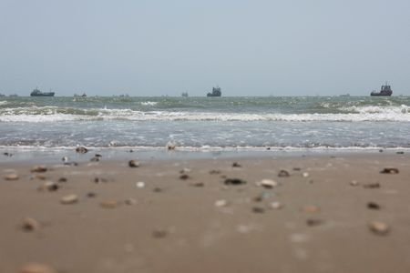 Vessels in the Strait of Hormuz are visible near the