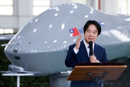 FILE PHOTO: Taiwan President Lai Ching-te speaks in front of
