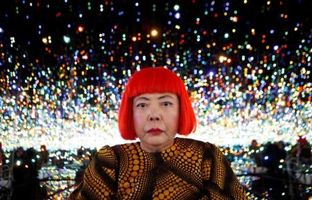 FILE PHOTO: Japanese artist Kusama poses inside her Infinity Mirrored