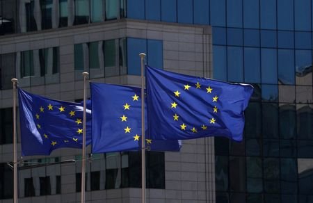 FILE PHOTO: European Union flags flutter in Brussels