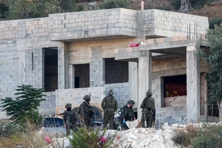 Israeli military forces, following an Israeli airstrike in Jenin