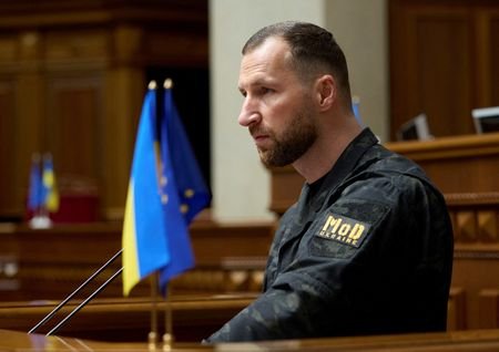 A newly appointed Ukrainian Defence Minister Yevhenii Khmara attends a