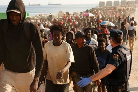 FILE PHOTO: Spanish police evicts migrants from Ceuta beach camp,