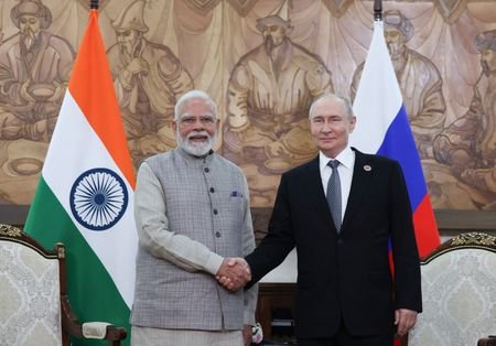 Russian President Putin and Indian Prime Minister Modi meet in
