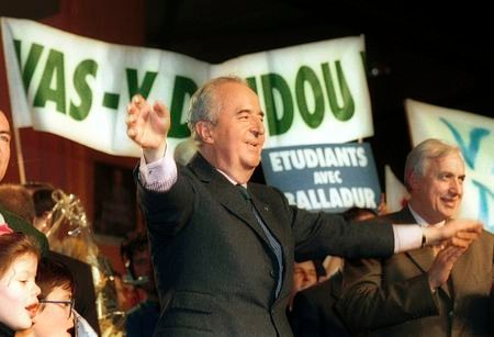 French Prime Minister and Presidential candidate Edouard Balladur waves at