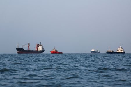 Vessels in the Strait of Hormuz are visible near the
