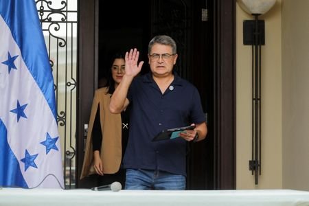 Former Honduran President Hernandez holds a press conference outside his