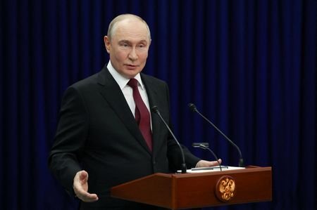 Russian President Putin talks to the media after SCO summit