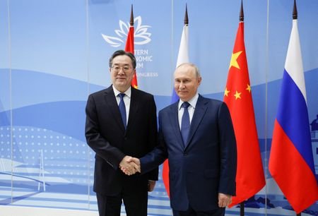 Russian President Vladimir Putin meets with Chinese Vice Premier Ding