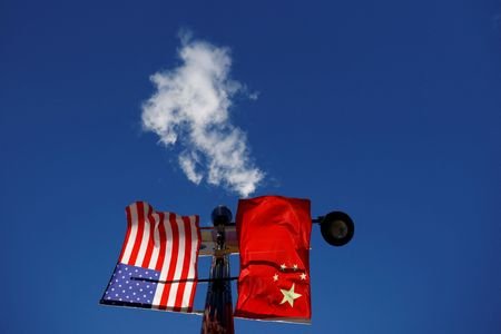 FILE PHOTO: The flags of the United States and China