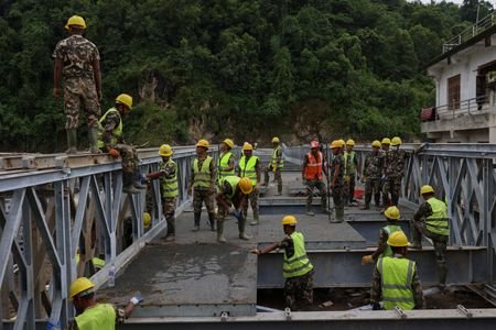 Nepal rescuers focus on 900 hydropower workers, 121 could be trapped in tunnels, officials say