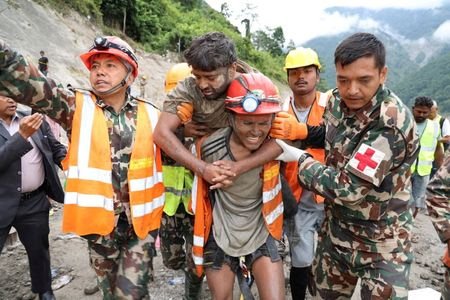 Sanjay Sah is carried by members of a search and