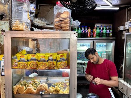 Explainer-Raids, shutdowns, warning labels – India’s unprecedented food safety push