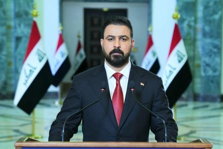 Iraqi Prime Minister Ali al-Zaidi delivers a televised address after