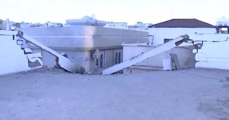 A damaged building in the aftermath of Houthi strikes