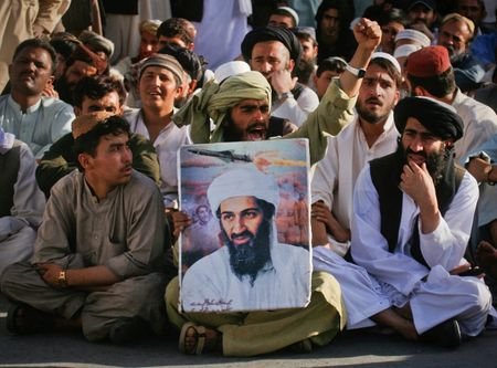 FILE PHOTO: Supporters of al-Qaeda leader Osama bin Laden shout