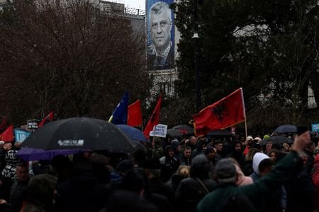 FILE PHOTO: Kosovars protest in support of ex-fighters on trial