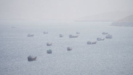 FILE PHOTO: Vessels near the Strait of Hormuz, as seen