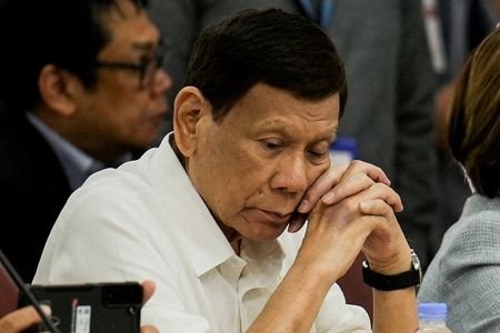 FILE PHOTO: Former Philippine President Rodrigo Duterte attends the House