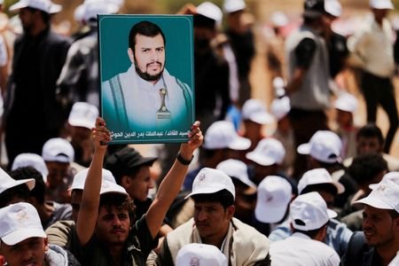 FILE PHOTO: University students parade to show support to Houthis