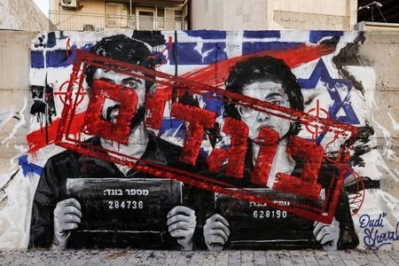 Graffiti depicting Yuval Abraham and Rachel Szor, the directors of