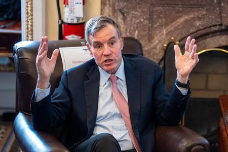 Sen. Mark Warner, D-VA., speaks to the media on Capitol