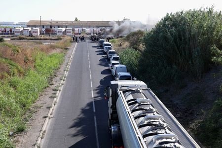 French fishermen block a fuel depot to protest rising fuel