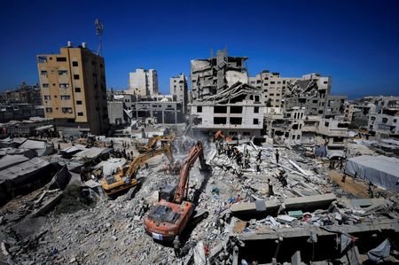 Rescue operations at the site of a war-damaged building collapse