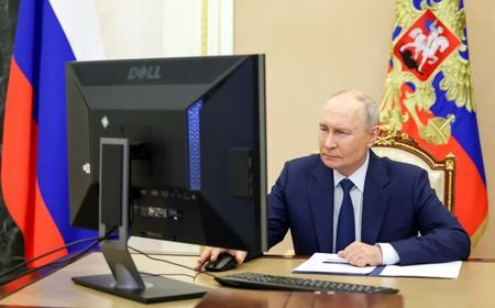 Russian President Putin votes online in the parliamentary election in