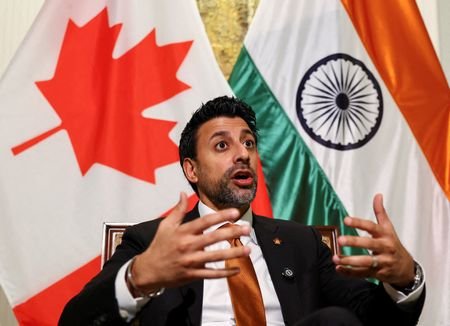 Canadian Minister of International Trade Maninder Sidhu gestures as he