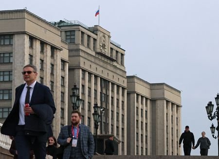 People walk near the State Duma in Moscow