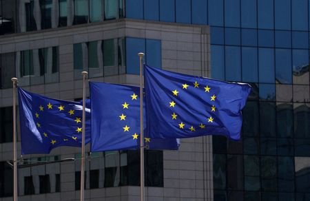 FILE PHOTO: European Union flags flutter in Brussels