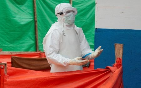 FILE PHOTO: Congolese medical workers dressed in personal protective equipment
