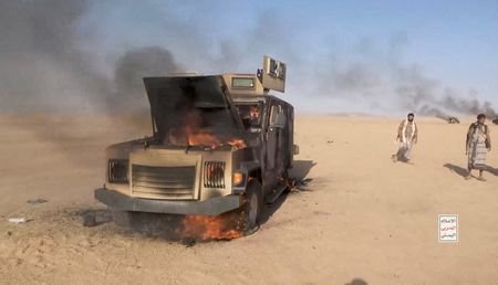 FILE PHOTO: Battle between Iran-aligned Houthi fighters and Saudi backed