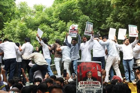 Supporters of India’s main opposition Congress party attend a protest