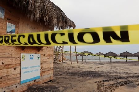 A beach area is secured by municipal Public Security authorities