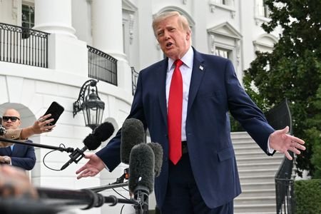US President Donald Trump departs the White House to travel