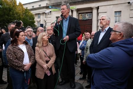 Judge issues a temporary injunction stopping an Orange Order march,