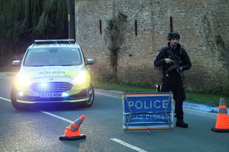 A police officer blocks a road near the RAF Fairford