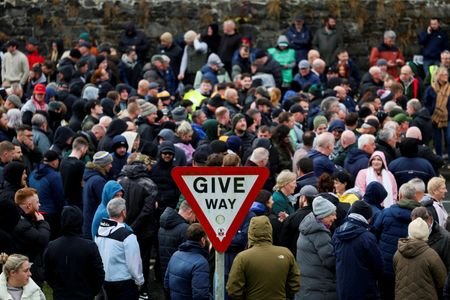 Protesters block Orange Order from marching through Catholic area in Northern Ireland