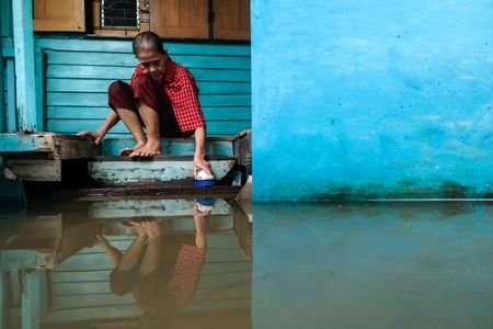 Thousands huddle in Bangkok shelters as Thai flood damages seen at over $320 million