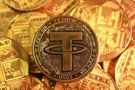 Illustration shows representation of Tether stablecoin cryptocurrency