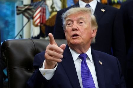 US President Trump makes an announcement from the Oval Office