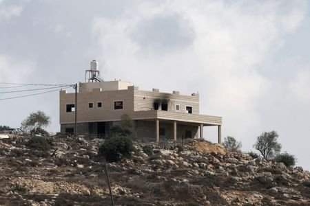 Palestinians inspect damage after reported settler attack in West Bank